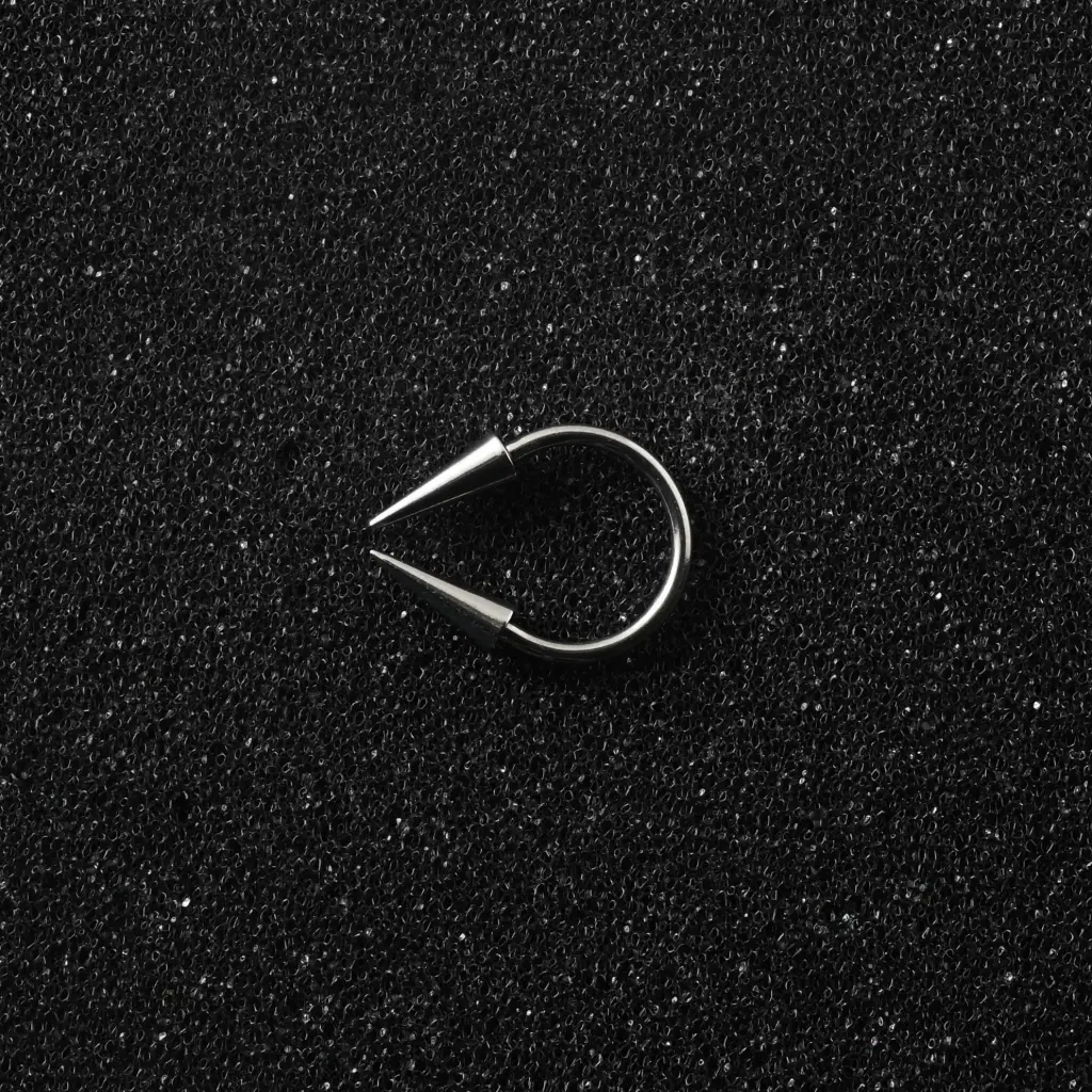 Пірсинг з медичної сталі підкова з шипами 16 G септум