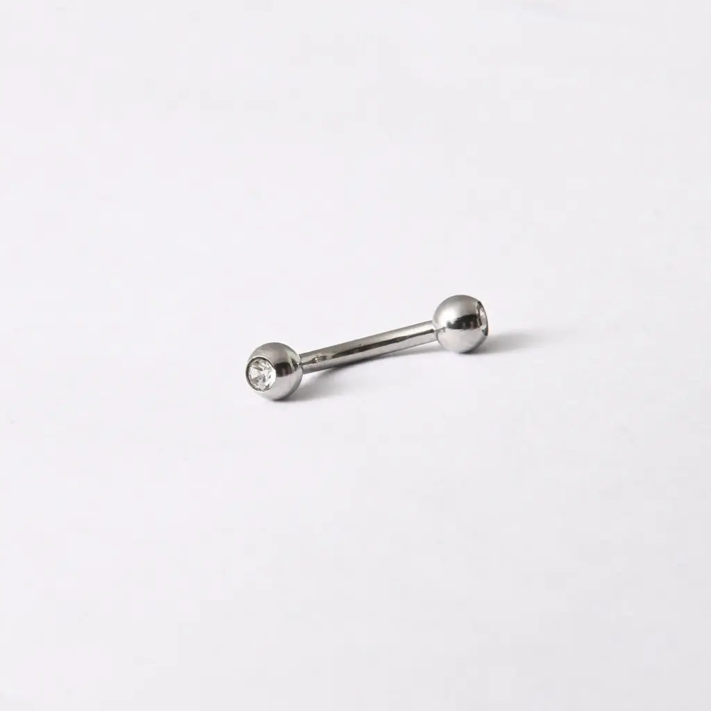 Пірсинг з медичної сталі мікробанан з білим каменем 16 G для брови