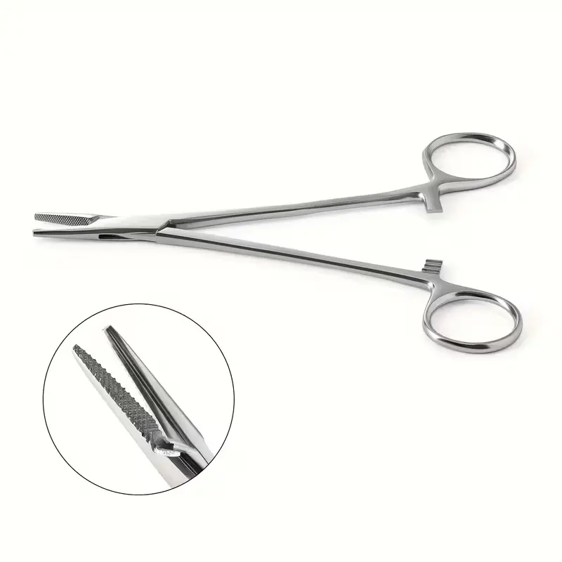 Голкотримач з насічками затискач для пірсингу