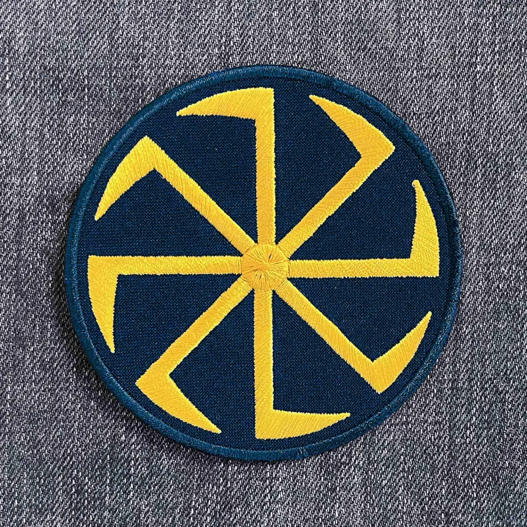 Нашивка Коловорот жовта вишита кругла на липучці