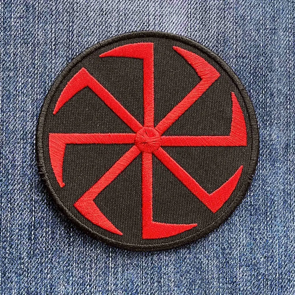 Нашивка Коловорот червона вишита кругла