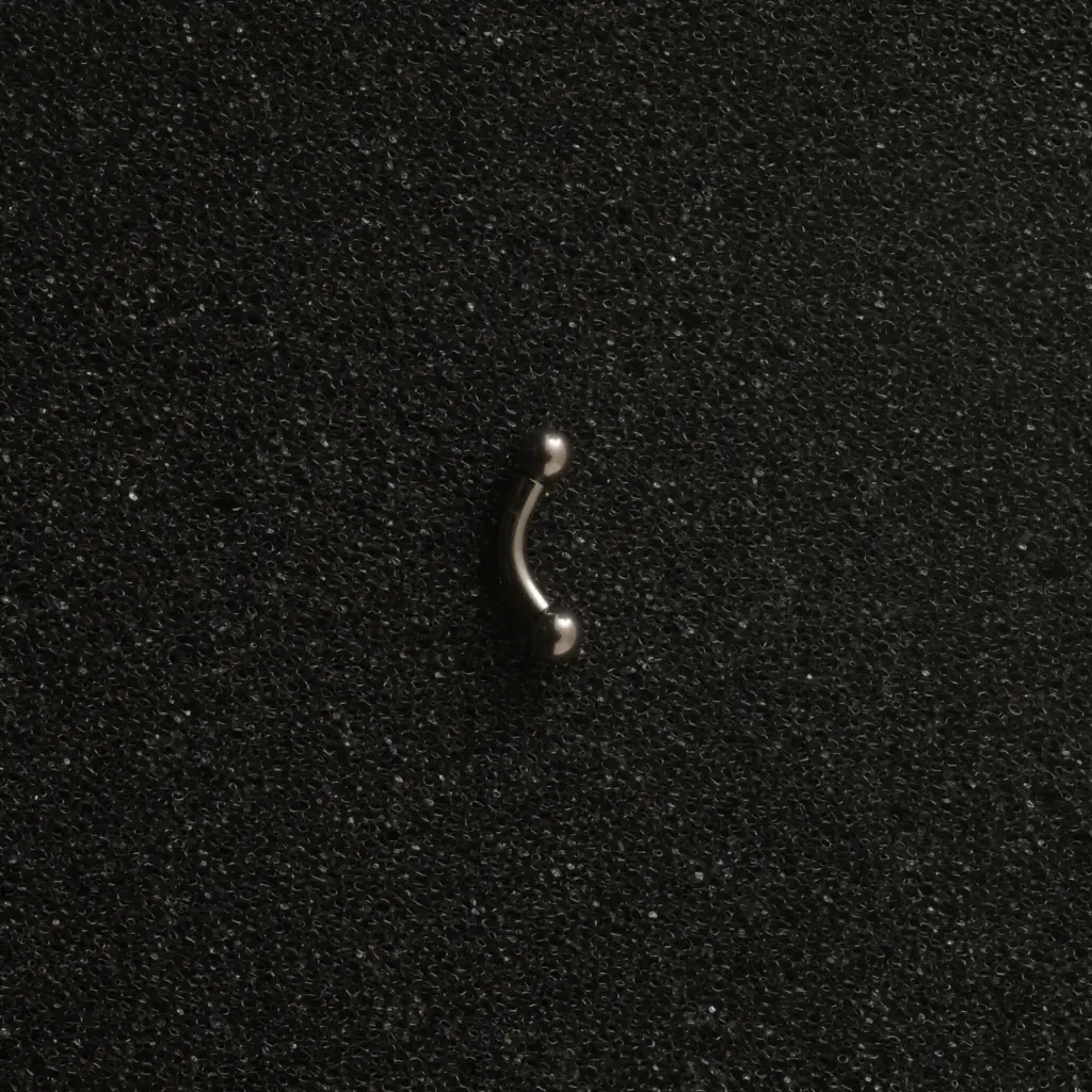 Пірсинг титановий мікробанан 14 G для брови