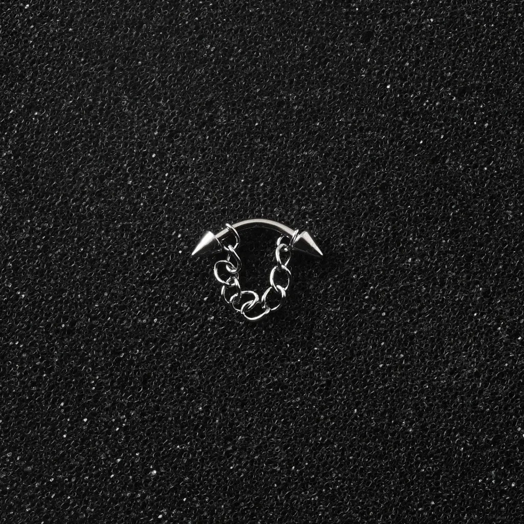 Пірсинг з медичної сталі мікробанан з шипами та ланцюжком 16 G для брови