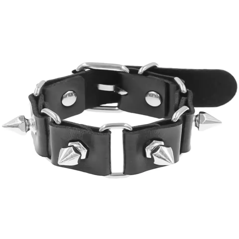 Шкіряний браслет з металевими вставками та шипами