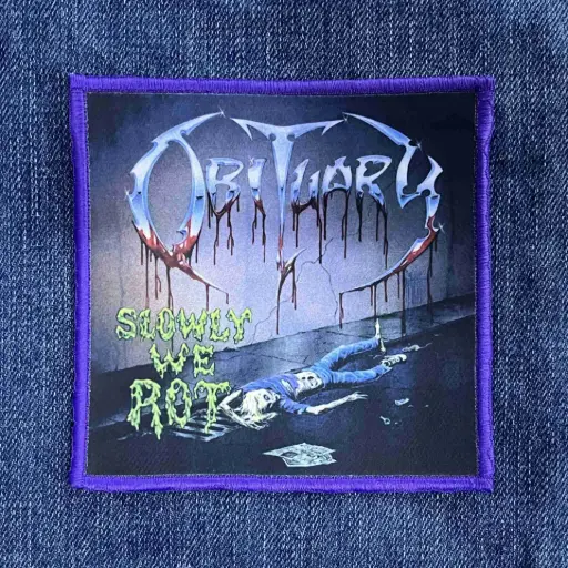 [414] Нашивка Obituary - Slowly We Rot друкована фіолетова кайма