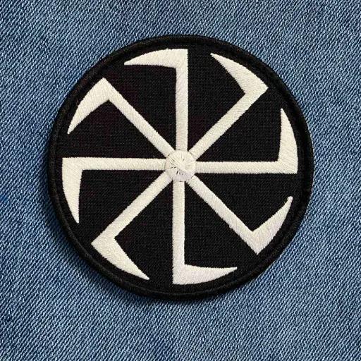 [1403] Нашивка Коловорот біла вишита кругла на липучці